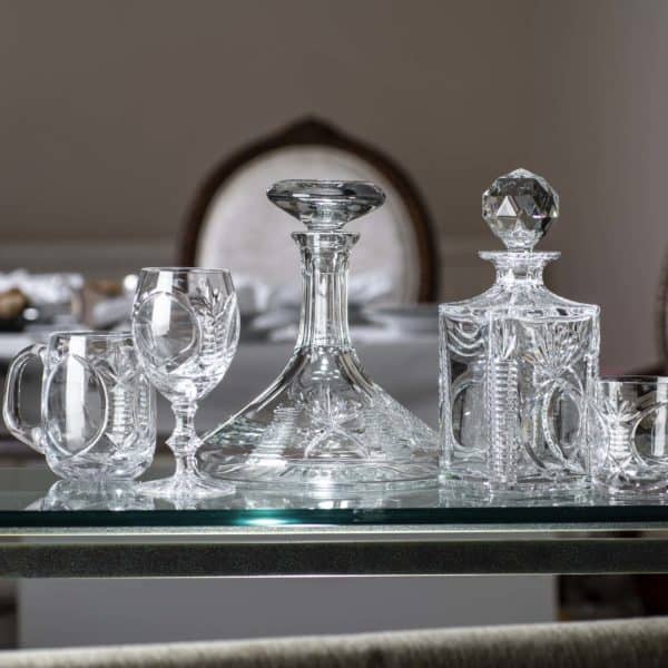 Glencairn Crystal The <a href="https://glencairn.co.uk/product-category/collections/bothwell">Bothwell</a> collection features an incredibly traditional yet elegant hand cut pattern on high quality mouthblown crystal and was the first glassware range to emerge during the early days of Glencairn Crystal. Accompanied by two <a href="https://glencairn.co.uk/product/bothwell-whisky-tumbler">Bothwell Whisky Tumblers</a>, the square decanter beautifully stores your whisky whilst being a lavish statement piece for your home. Supplied in a luxurious wooden mahogany gift box, this Bothwell decanter set is a wonderful whisky gift for special occasions.