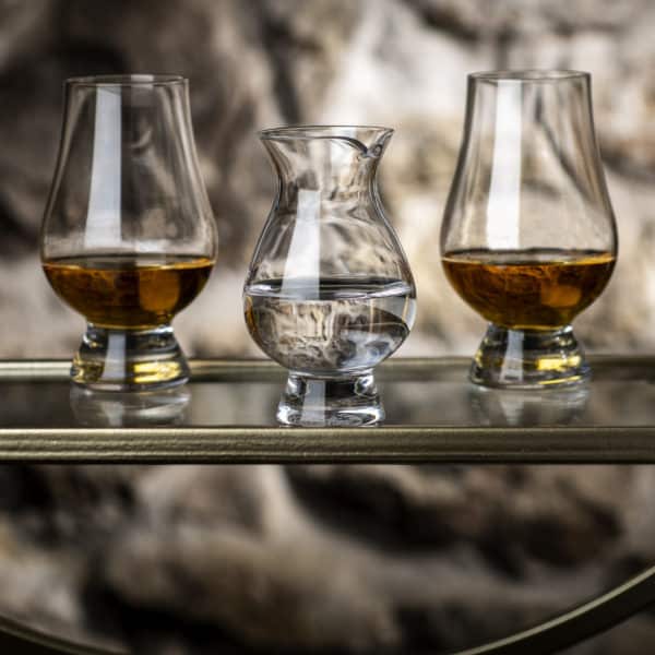 Glencairn Crystal Elevate your whisky experience with our Glencairn Glass and Wee Jug Set. This perfect pairing, featuring one Glencairn glass and one Wee Jug, is ideal for savouring your favourite spirits. Crafted for true whisky enthusiasts, it enhances the nuances of aroma and flavour, making it a must-have for your collection. Whether you're treating yourself or looking for a thoughtful gift, the Glencairn Glass and Wee Jug Set delivers a remarkable tasting journey. Cheers to exceptional taste!
